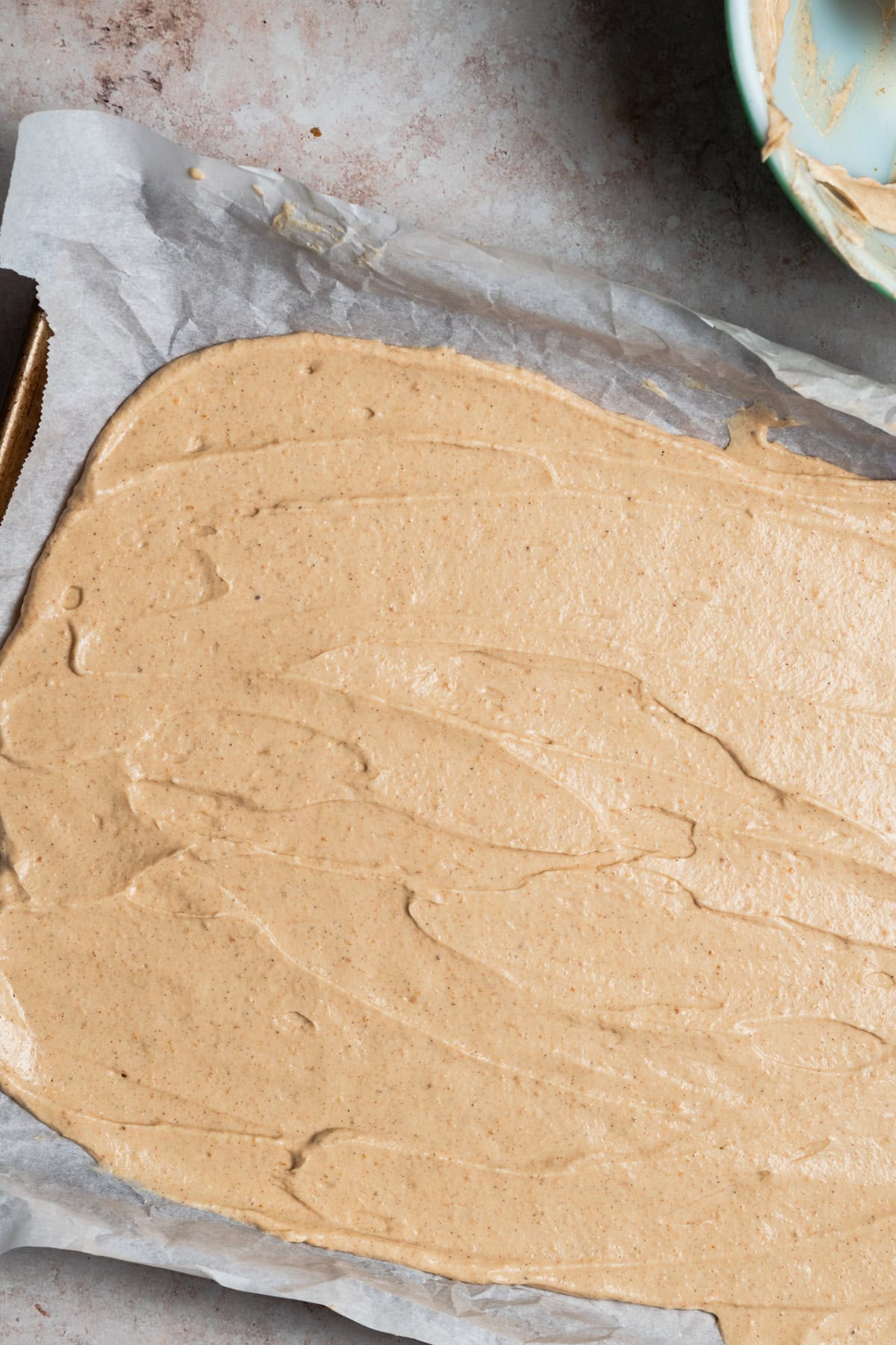 The yogurt is spread on a baking sheet.