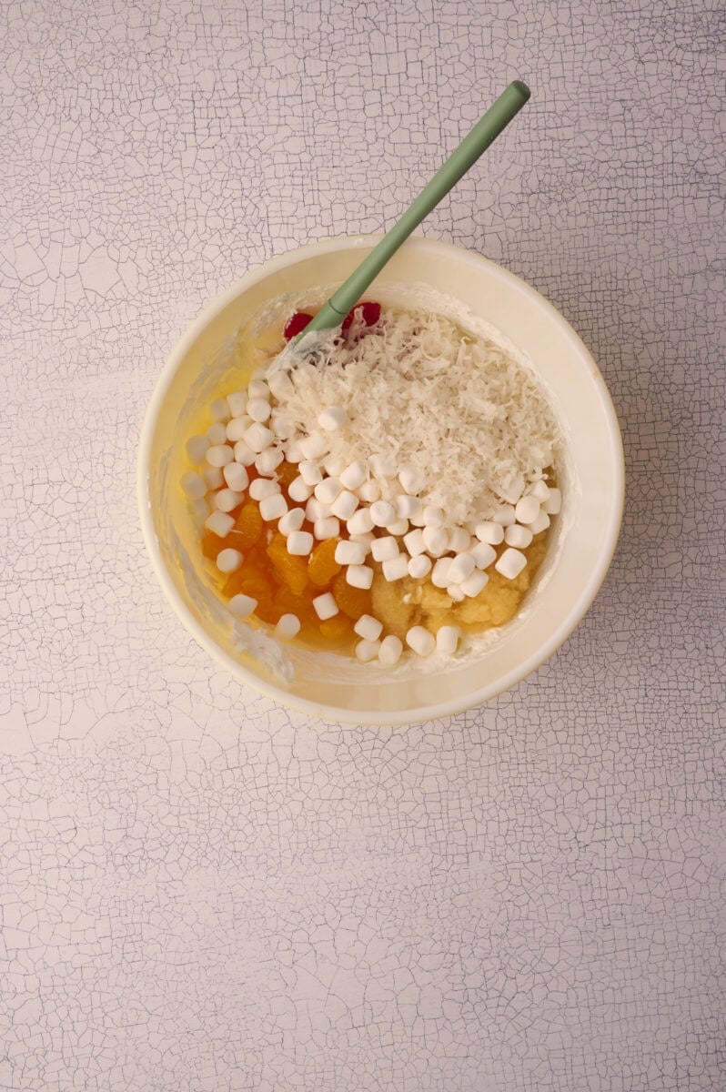 The marshmallows are added to the dish.