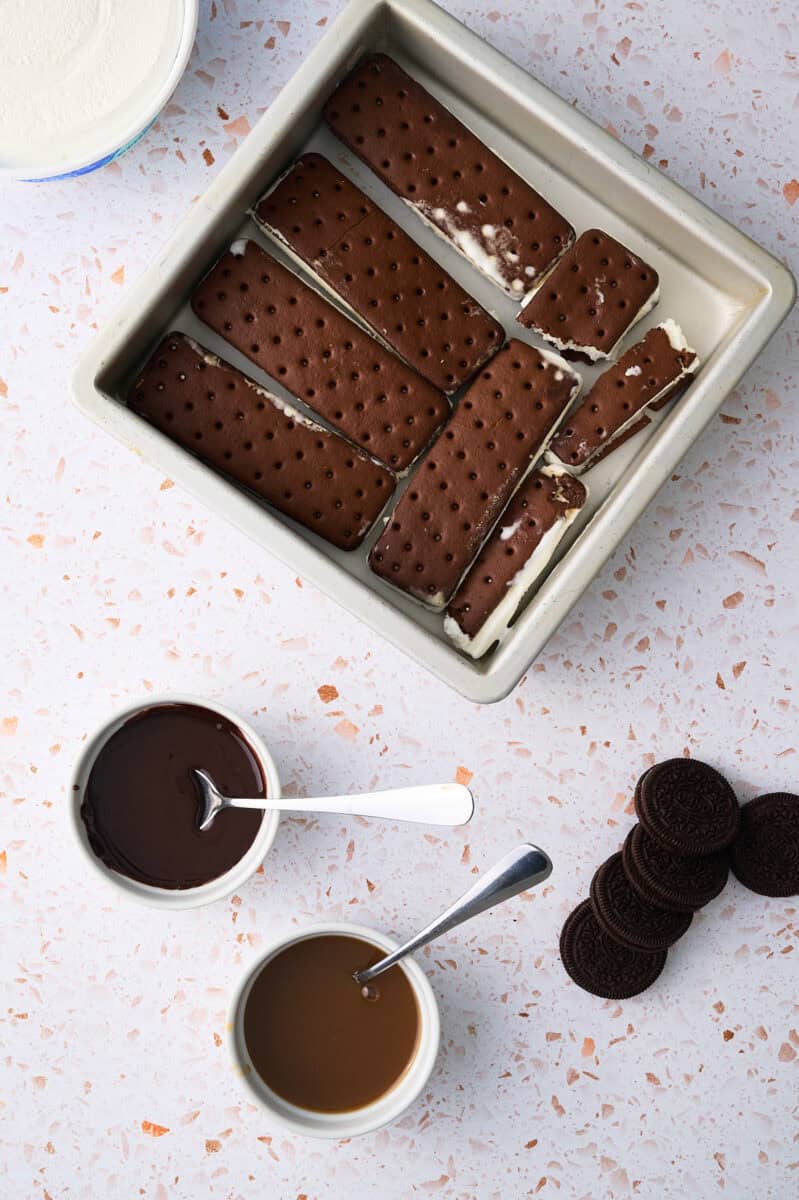 The ice cream sandwiches are in a pan.
