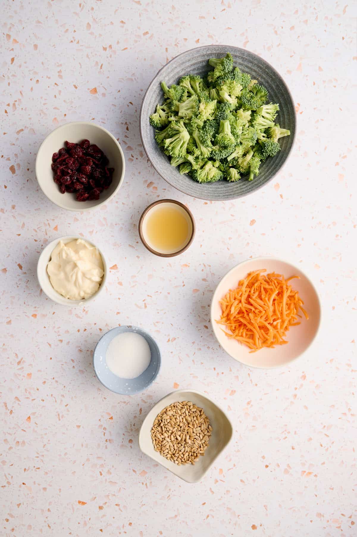 The ingredients for the broccoli crunch salad are laid out.