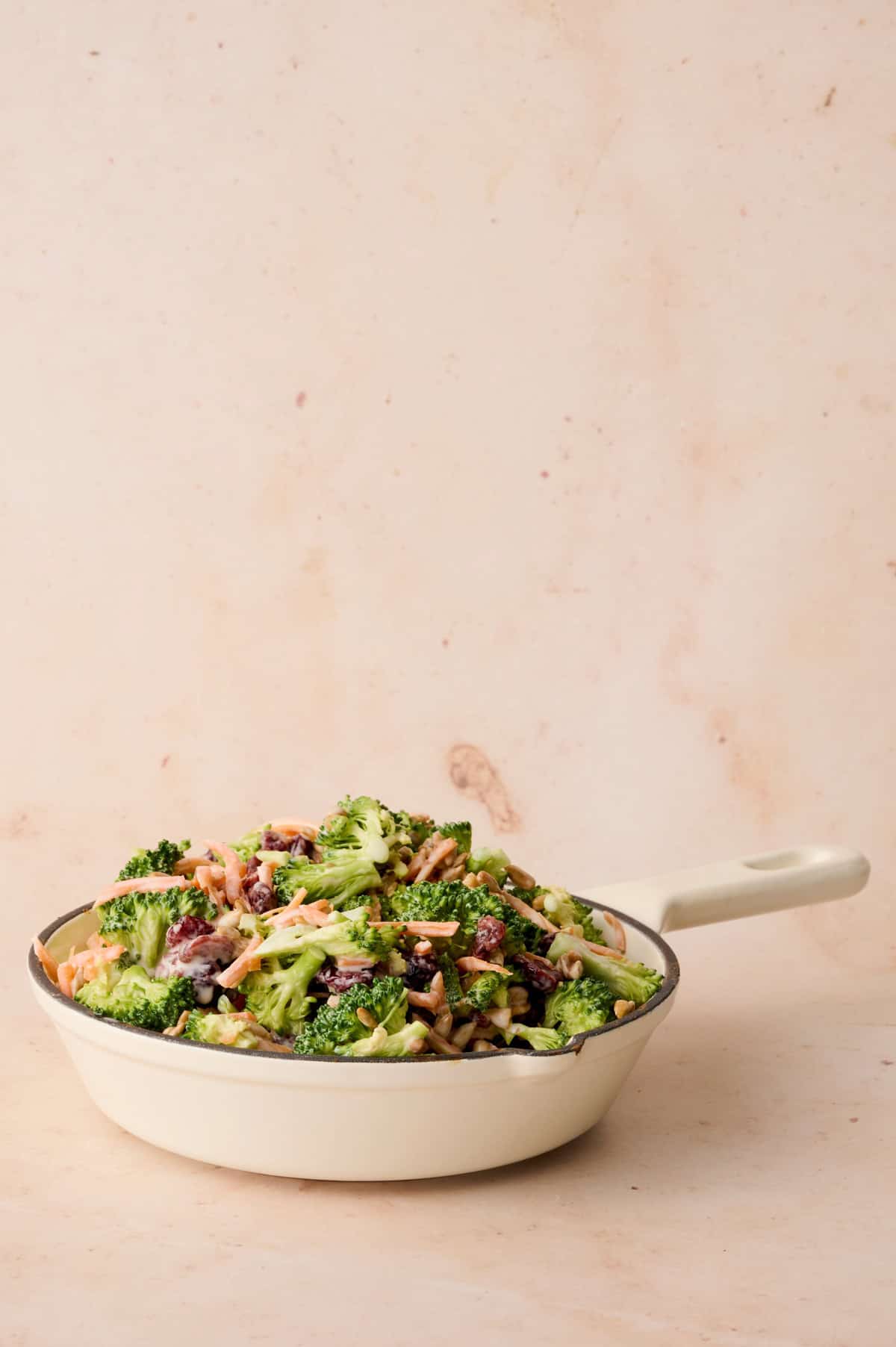 The broccoli crunch salad is in a pan