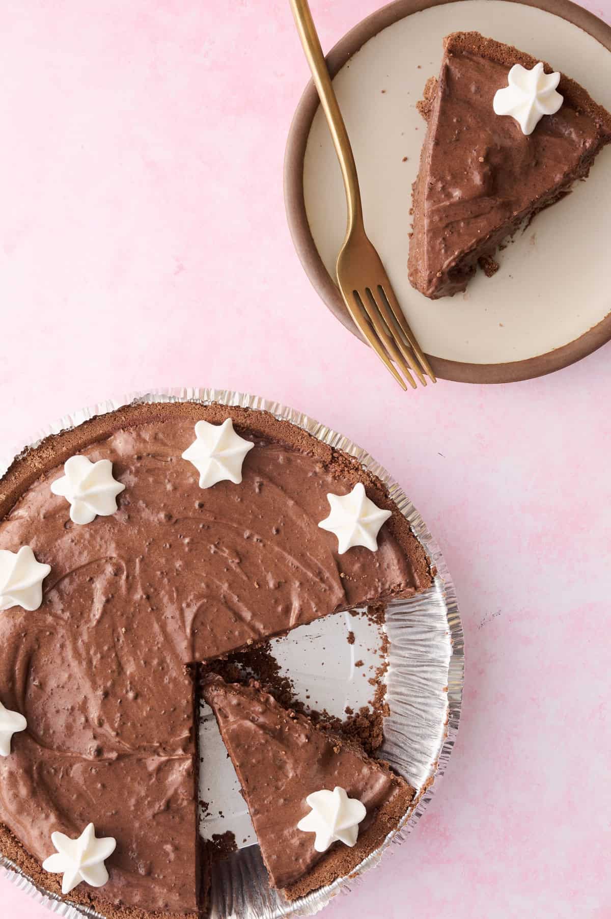 A slice of the no bake chocolate pie is on a plate.